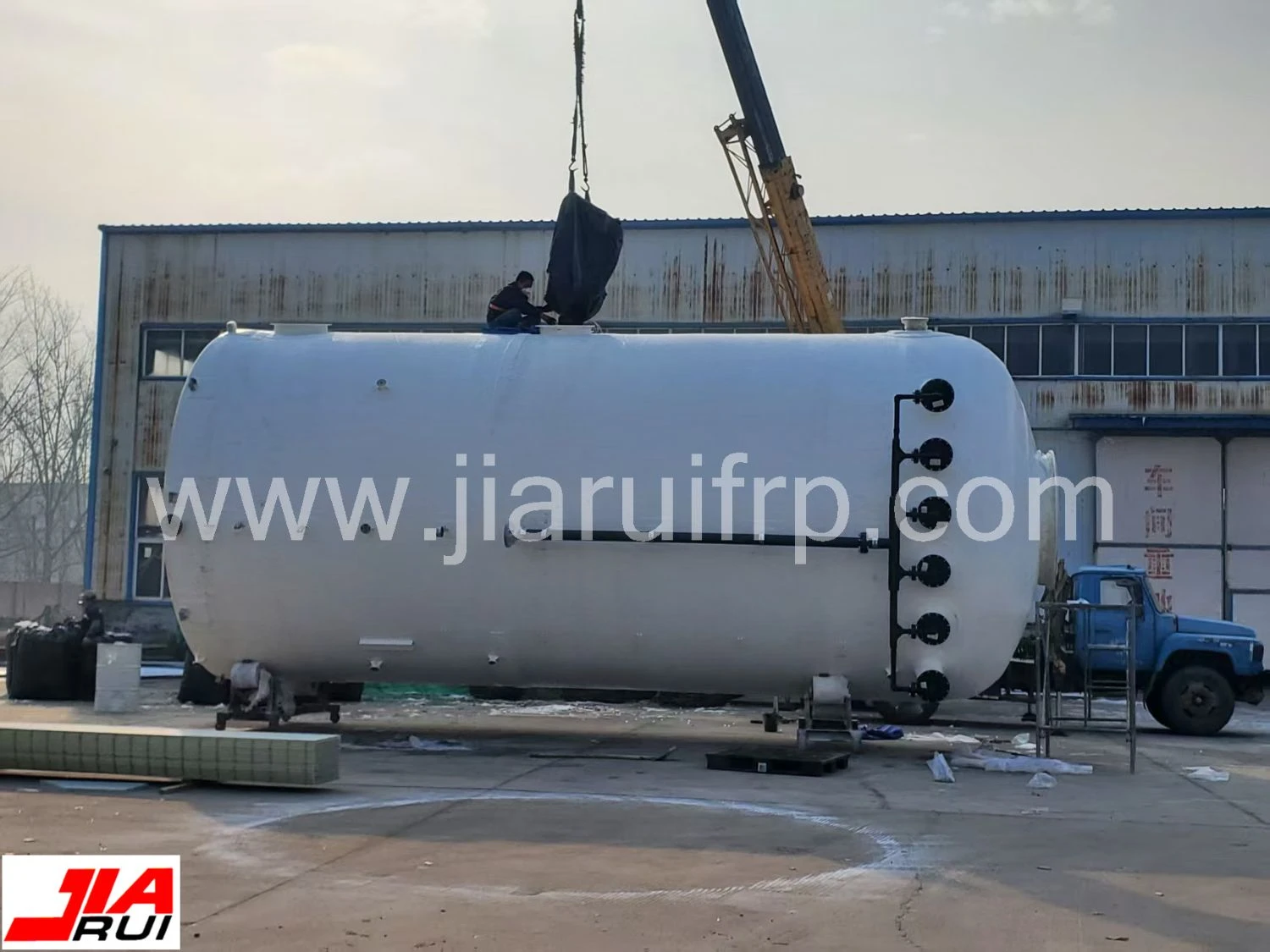 GRP tower being filled with packing GRP tower being filled with packing